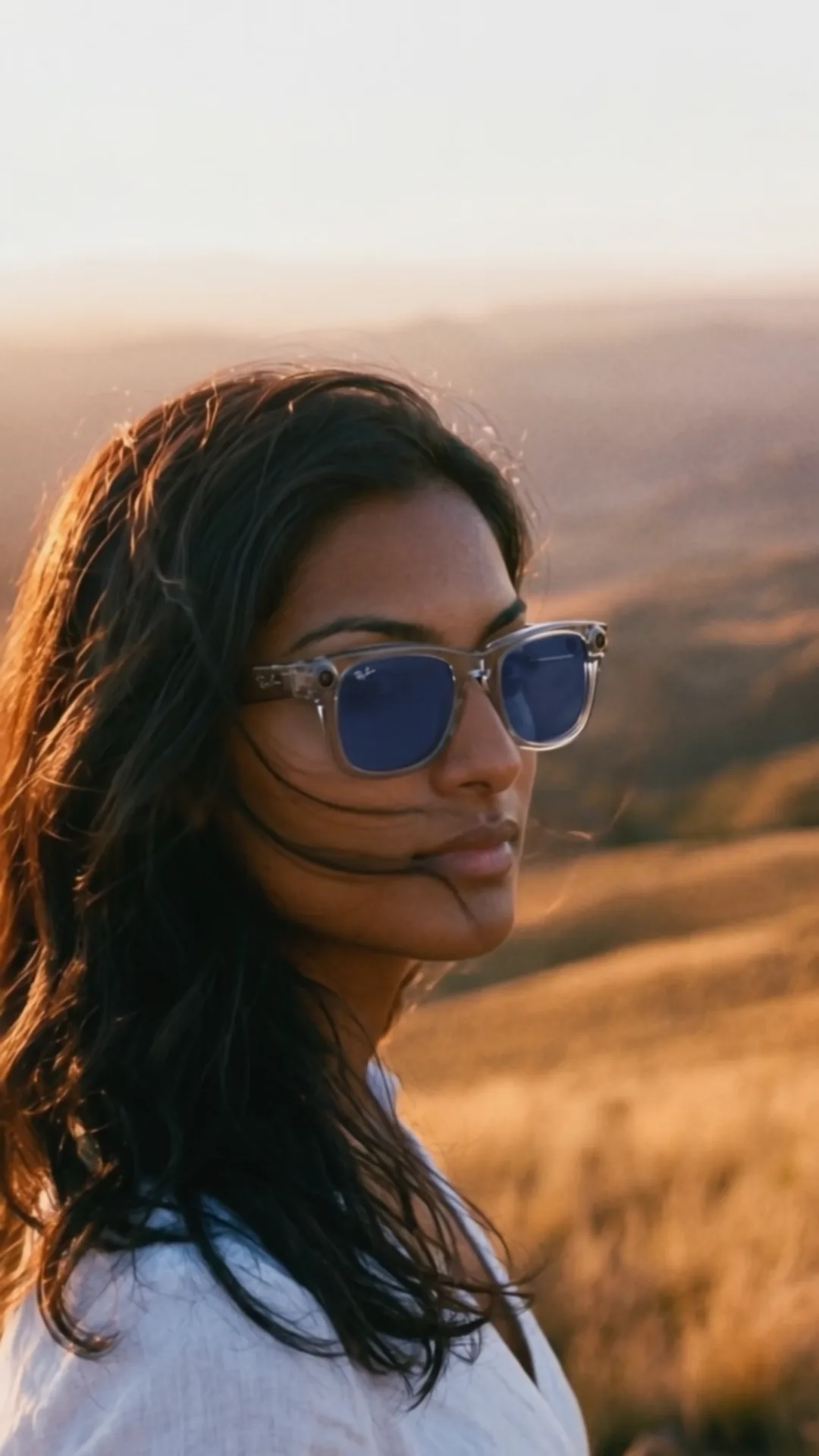 From Ray-Ban Meta: a woman on a hill at dusk